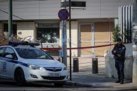 Unsere Fotos (© Eurokinissi) sind am Sonntag (21.10.) vor der kanadischen Botschaft in Athen entstanden.