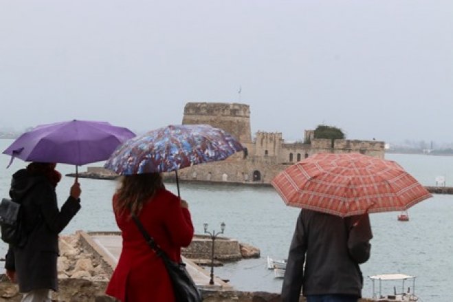 Am Wochenende wird man wohl den Regenschirm auspacken müssen. (Foto: © Eurokinissi)