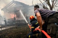 Unsere Fotos (© Eurokinissi) entstanden am Freitag (6.8.) in der Nähe von Athen.