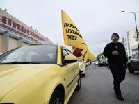 Unsere Fotos (© Eurokinissi) entstanden während der Protestaktion der Taxifahrer in Athen.